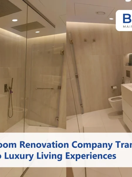 A modern, bathroom designed by a Bathroom renovation company, featuring a dual-sink vanity, glass-enclosed walk-in shower with rainfall heads, and warm ambient lighting.