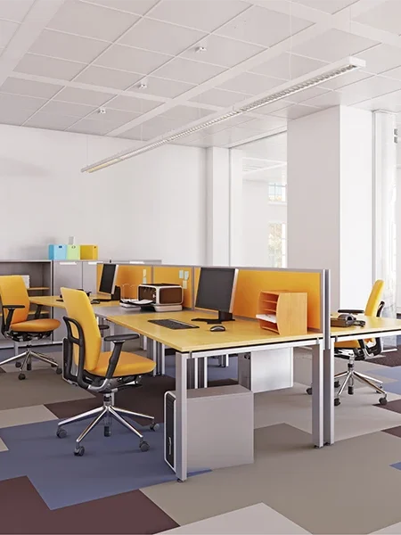 Office renovation company in Dubai showcasing a modern office interior with open workstations and collaborative spaces.