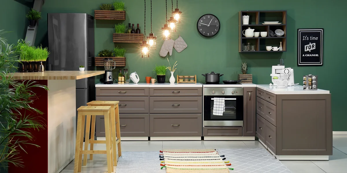 Modern kitchen with coordinated wall colours and layered lighting for kitchen renovation services